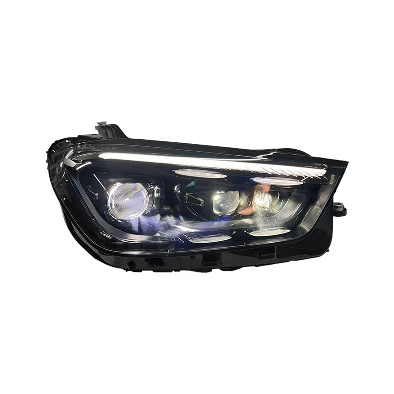 How do car headlights prevent glare and improve visibility?